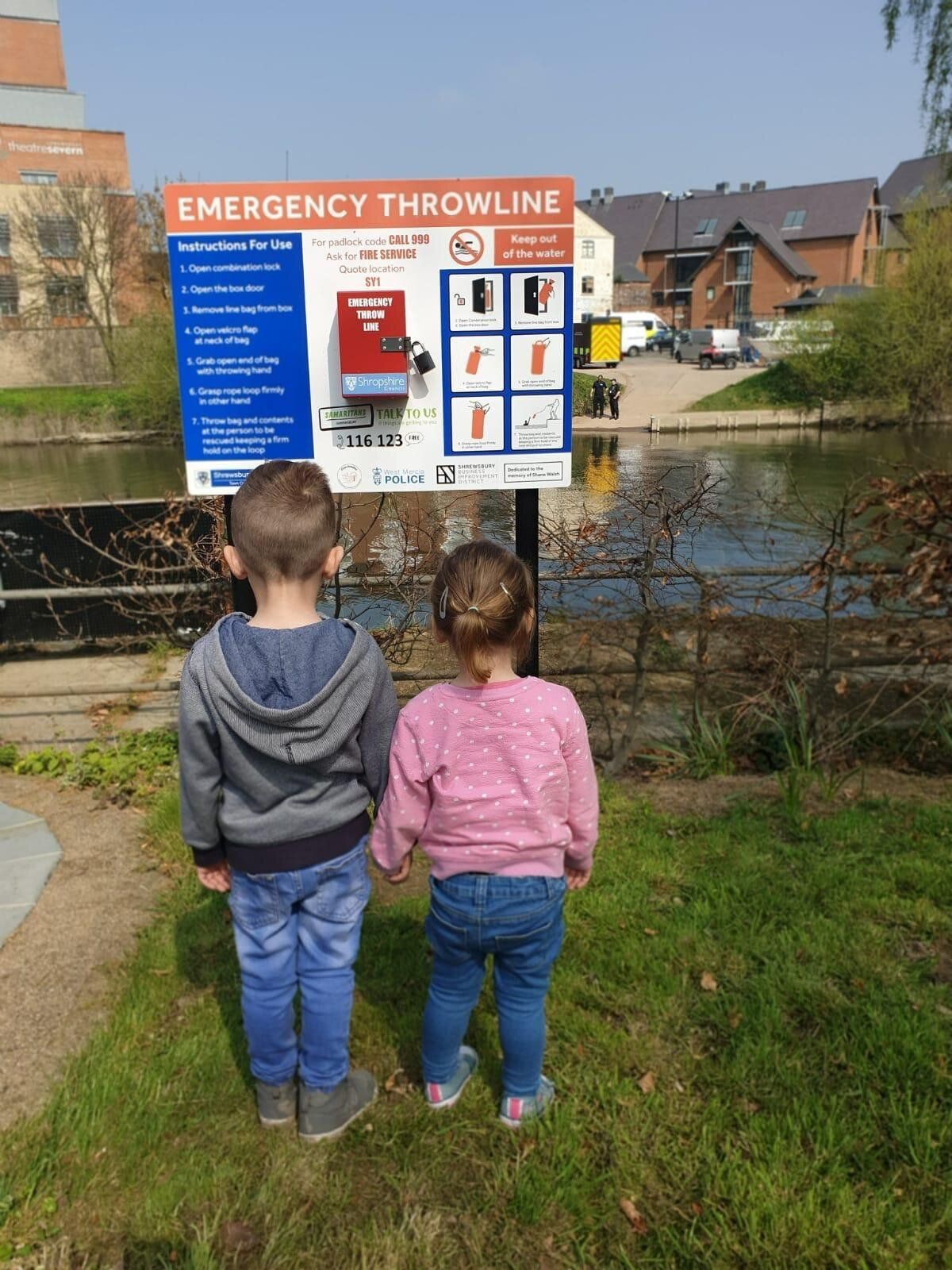 Corey and Adalynn Walsh in front of the emergency throwline, which was installed after Kirsty's campaign.