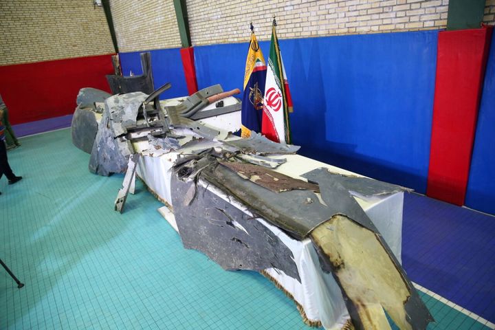 The purported wreckage of the American drone is seen displayed by the Islamic Revolution Guards Corps (IRGC) in Tehran, Iran 21 June.