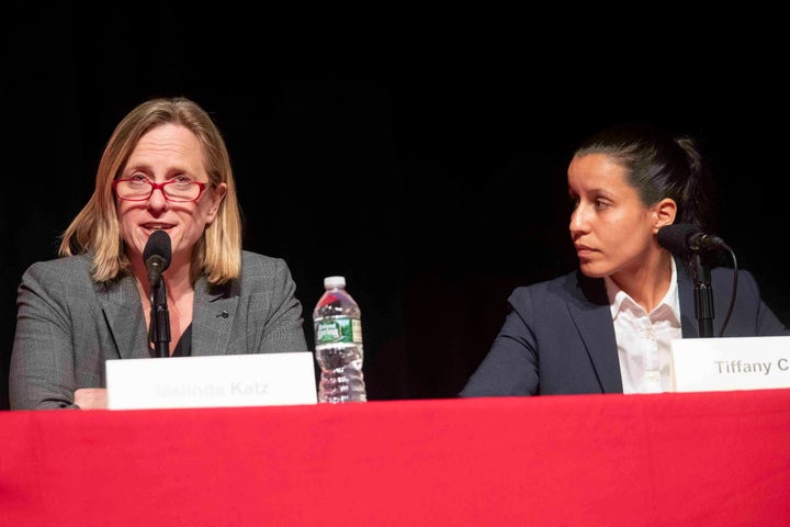 Queens Borough President Melinda Katz, left, speaks at a June 13 district attorney candidate forum as Cabán, right, looks on. Katz has sought to brand Cabán as extreme and unqualified.