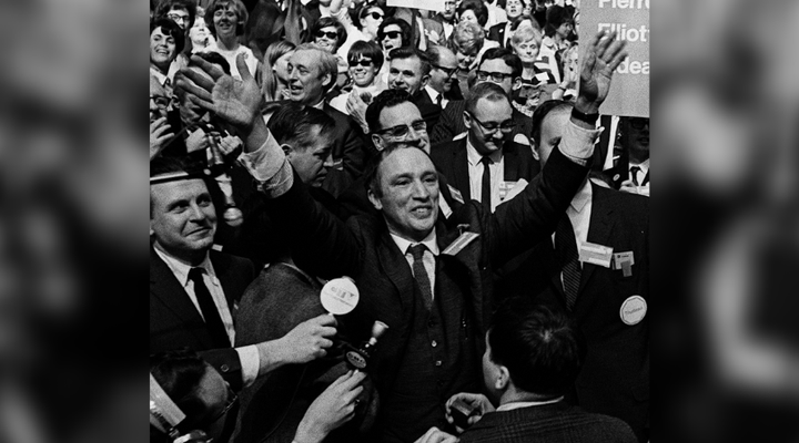 Pierre Elliott Trudeau raises his arms in the traditional victory sign after winning the leadership of the Liberal party of Canada In Ottawa April 6, 1968, before becoming prime minister.