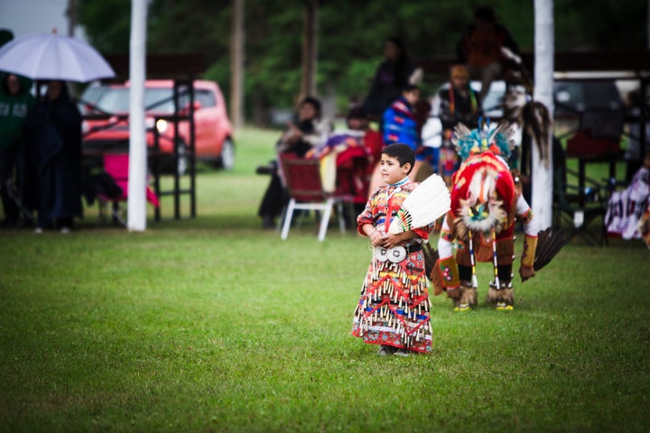 Alex Cameron Jr., 7, performs at a two-spirit <a href="https://www.huffingtonpost.ca/entry/nenookaasi-ogichidaa-black-indigenous-powwow_n_5ce59c4fe4b0547bd1316b3a" target="_blank" rel="noopener noreferrer">powwow</a> in Duck Lake, Sask. in June.