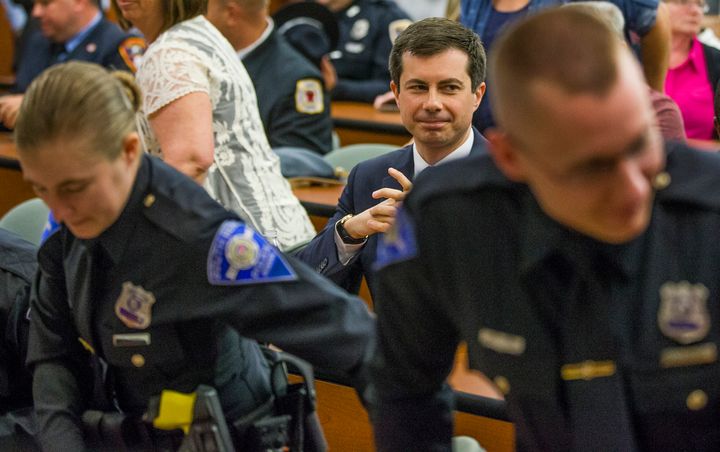 South Bend, Indiana, Mayor Pete Buttigieg attends the city's police officer swearing-in ceremony on Wednesday, days after a white officer fatally shot a black man in the city.