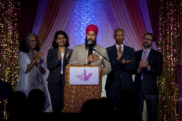 NDP leader Jagmeet Singh is joined by members of the NDP at the Canadian Muslim Vote's Eid Dinner, in Toronto, on June 21, 2019. 