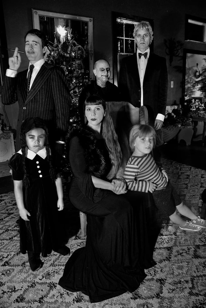 Every year we create a holiday card in homage to one of our artistic influences, and last year we choose the Addams Family, featuring Andy as Uncle Fester, Lee as Lurch, myself as Morticia, Clint as Gomez and Wilder doing double duty as Pugsley and Wednesday.