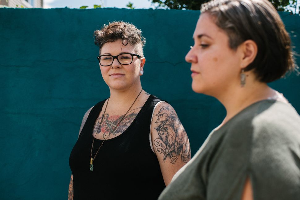 Dese'Rae Stage (left) and Felicidad Garcia, who both struggled with infertility, pose at their Philadelphia home on June 20, 2019.