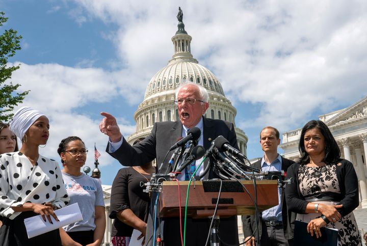 Democratic presidential candidate Bernie Sanders, flanked Monday by Rep. Ilhan Omar (D-Minn.), left, and Rep. Pramila Jayapal (D-Wash.) calls for legislation to cancel all student debt in a speech at the Capitol in Washington, D.C.