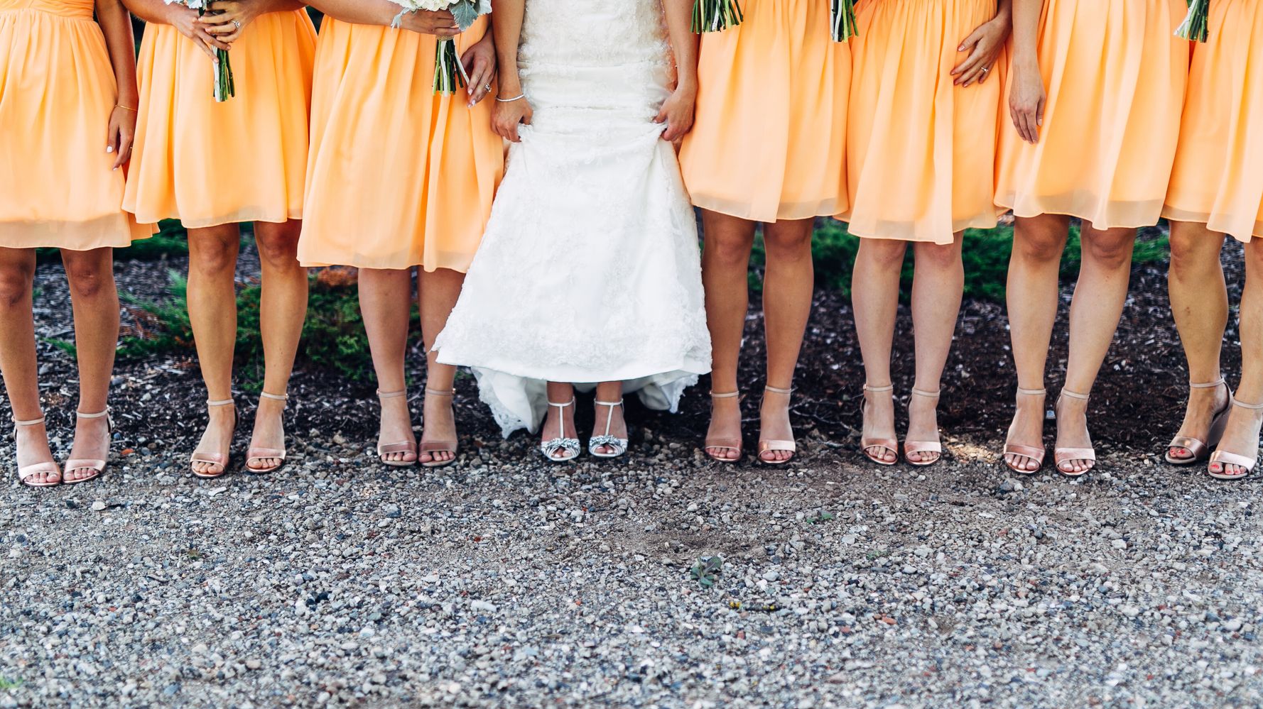 Woman Poses With Her 34 Bridesmaids – But How Many Is Too Many