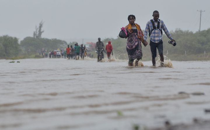 Residents brave floods in Mazive, southern Mozambique, in April after a powerful cyclone dumped heavy rains on the area.