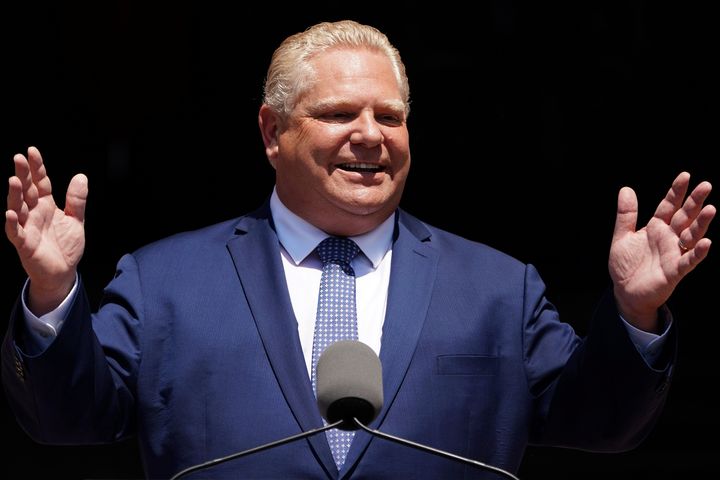 Ontario Premier Doug Ford gestures as he speaks during his unofficial swearing in ceremony in Toronto, June 29, 2018.