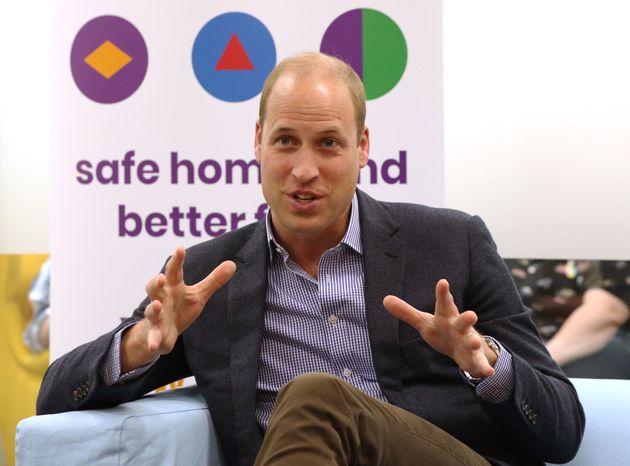 The Duke of Cambridge speaks to former and current service users during a visit to the Albert Kennedy Trust in London to learn about the issue of LGBTQ youth homelessness in London on June 26. 