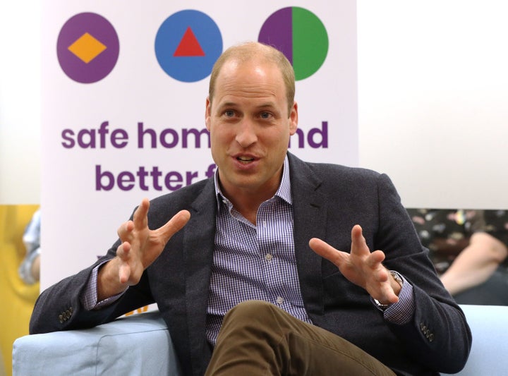 The Duke of Cambridge speaks to former and current service users during a visit to the Albert Kennedy Trust in London to learn about the issue of LGBTQ youth homelessness in London on June 26.
