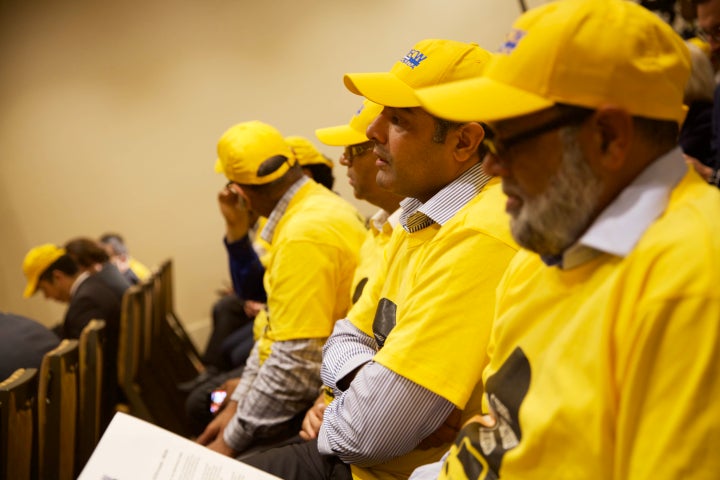 Dozens of Uber drivers gathered for a news conference in Toronto June 26, 2019, to share their decision to unionize.