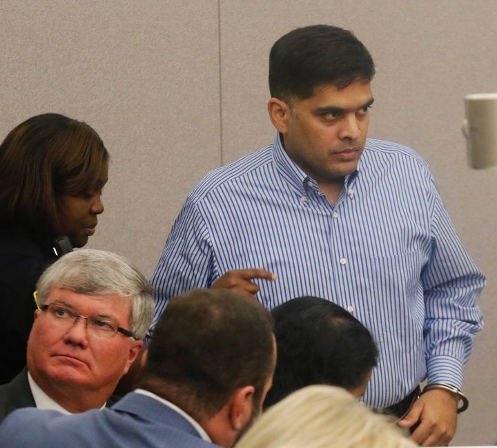 Wesley Mathews, father of Sherin Mathews, walks to the witness stand during a court hearing on 29 November 2017, in Dallas.
