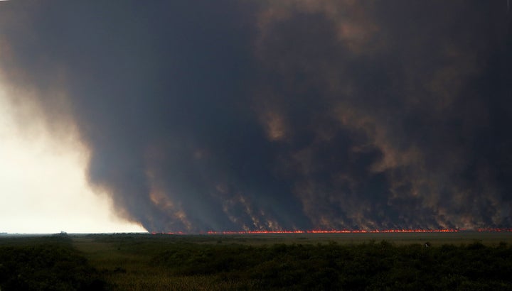 Smoke from a wildfire scorching tens of thousands of acres of the Everglades this week. 