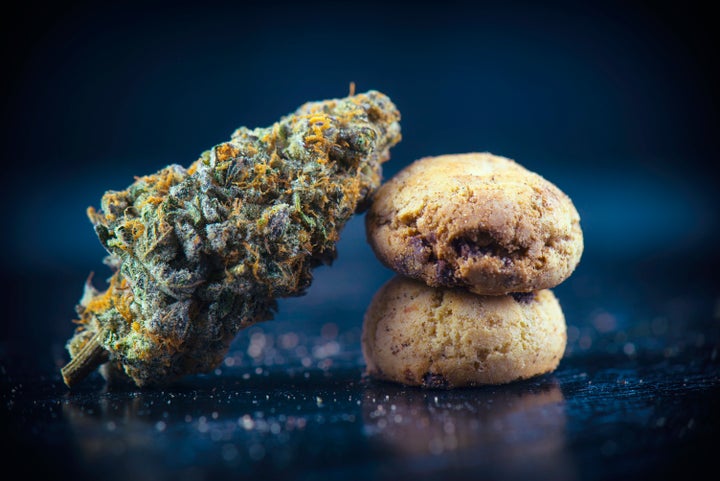 This photo shows cannabis and cannabis-infused chocolate chip cookies. 