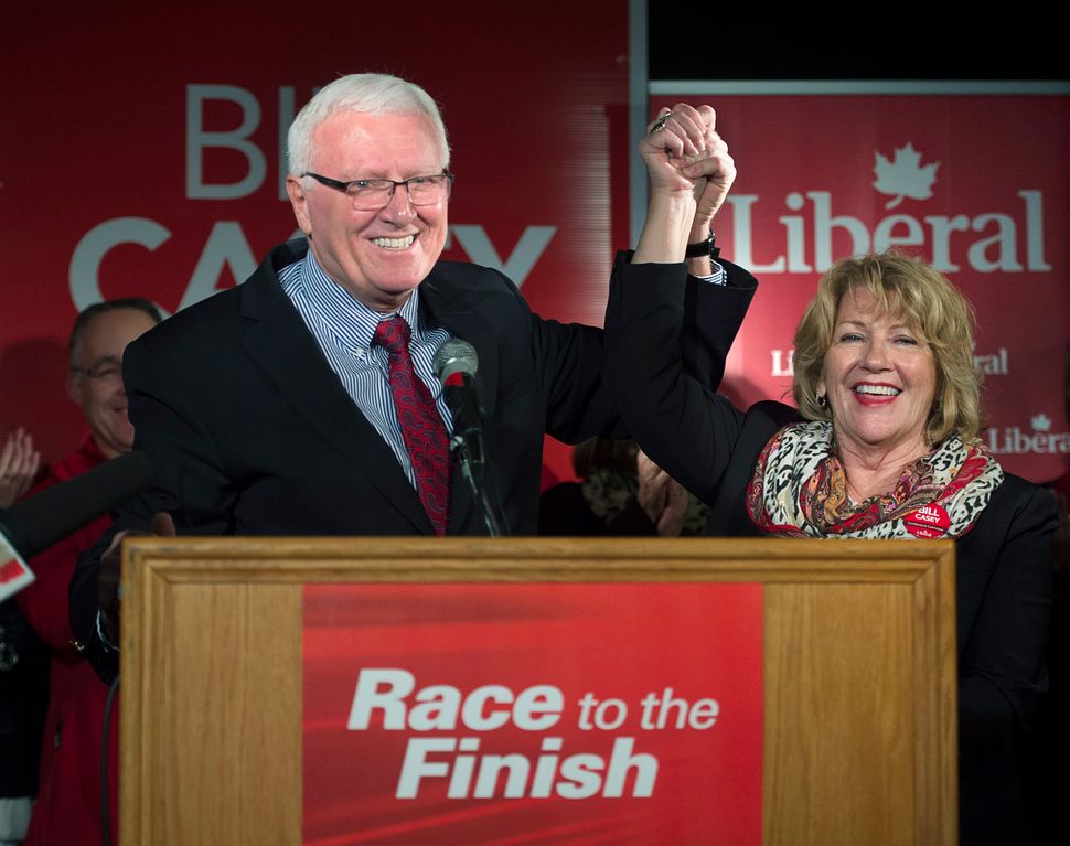 Bill Casey and his wife Rosemary address supporters after winning his seat in the 42nd Canadian general election in Amherst on Oct. 19, 2015.