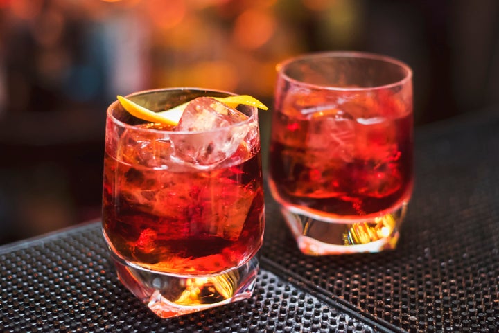 Classic Negroni cocktail on the black bar table