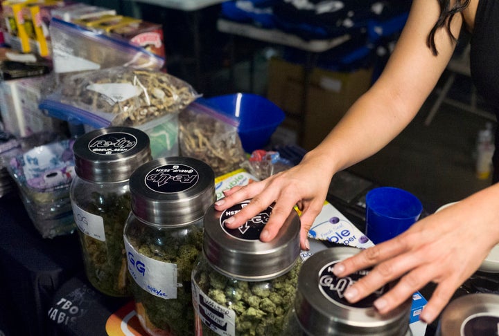 Bags of psilocybin mushrooms displayed alongside cannabis at a pop-up cannabis market in Los Angeles.