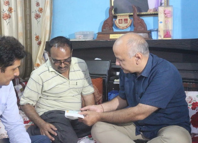 AAP Hands Over Rs 15 Lakh Cheque To Ankit Saxena’s