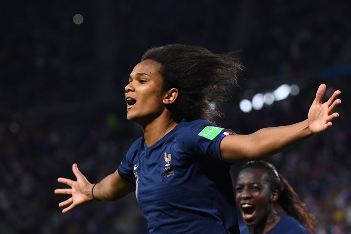 France's defender Wendie Renard celebrates after scoring a penalty kick during the 2019 Women's World Cup Group A football match between Nigeria and France, on June 17, 2019.
