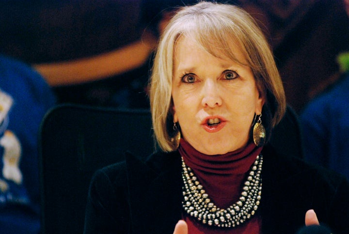 New Mexico Gov. Michelle Lujan Grisham talks after signing an executive order for state agencies to aggressively pursue strat