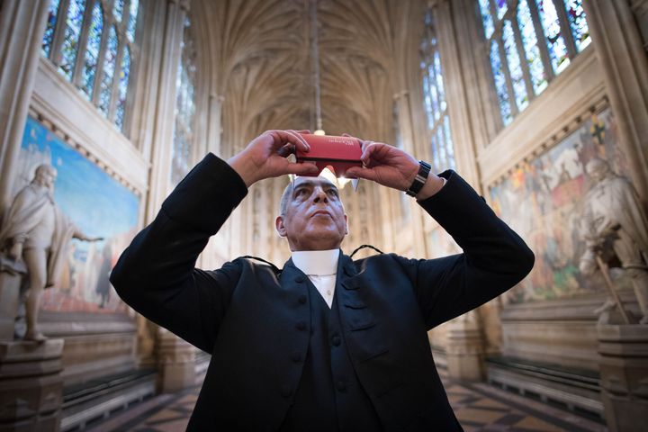 El-Hajji trying a headset which allows people to have a virtual reality tour of parliament.