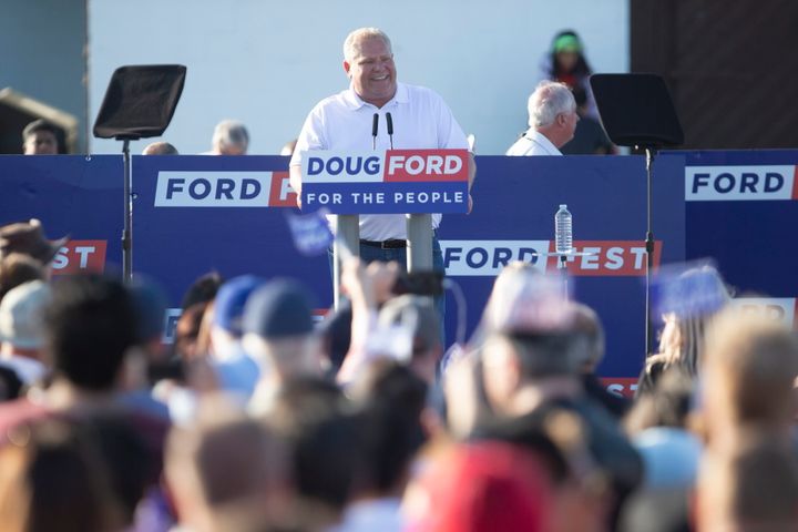 Ontario Premier Doug Ford addresses supporters at Ford Fest in Markham, Ont., on June 22, 2019. His government is cutting $164 million from legal aid over the next three years.