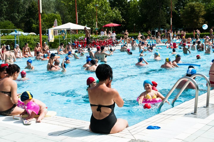 Health officials urge bathers to shower before entering a swimming pool, to not swallow any water and to not swim if they hav