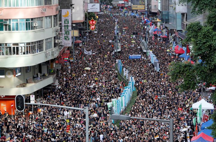 Anti-extradition bill protesters march during the anniversary of Hong Kong's handover to China.