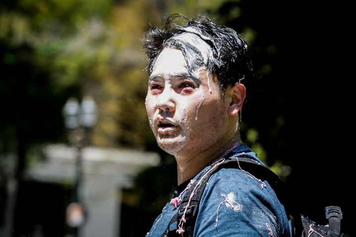 Unidentified individuals bloodied Andy Ngo, a conservative writer at Quillette, and splashed him with a milkshake at a rally hosted by far-right extremists in Portland, Oregon, on Saturday.