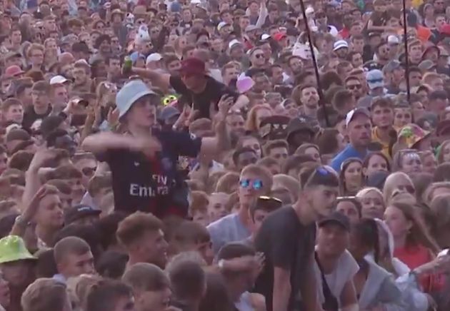 Alex on his friend's shoulders during Dave's set