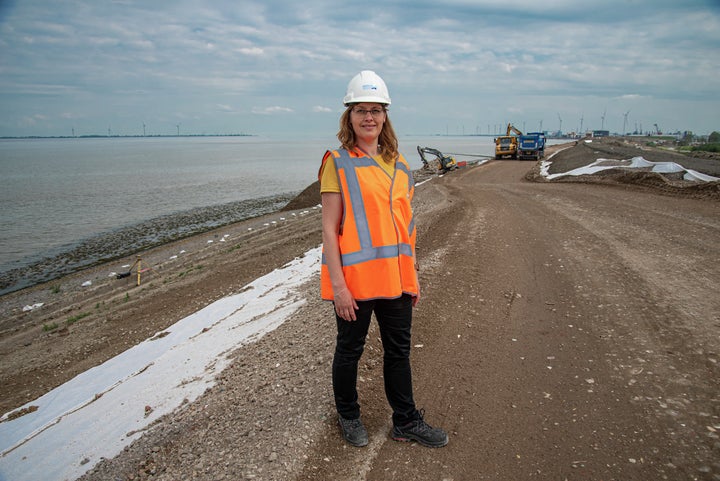 Silvia Mosterd standing on the dike near Delfzijl. Mosterd works for one of the 21 regional Dutch water boards, which form the backbone of the Dutch water management system. When the Dutch vote for their member of parliament, they also elect representatives to their regional water boards.