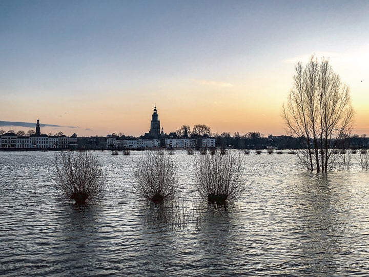 The Ijssel river floods farmland near the city of Zutphen.