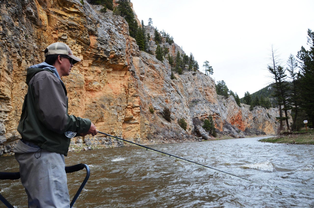 An angler fishes for trout along the scenic Smith River.