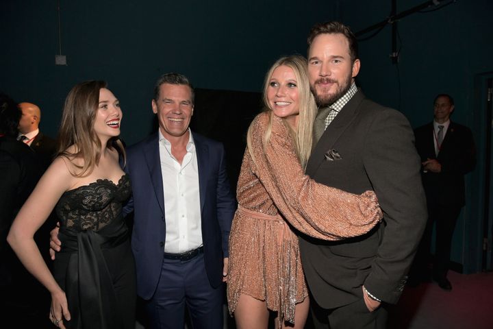 Gwyneth Paltrow hugs Chris Pratt as Elizabeth Olsen and Josh Brolin look on at the “Avengers: Infinity War” premiere in 2018.