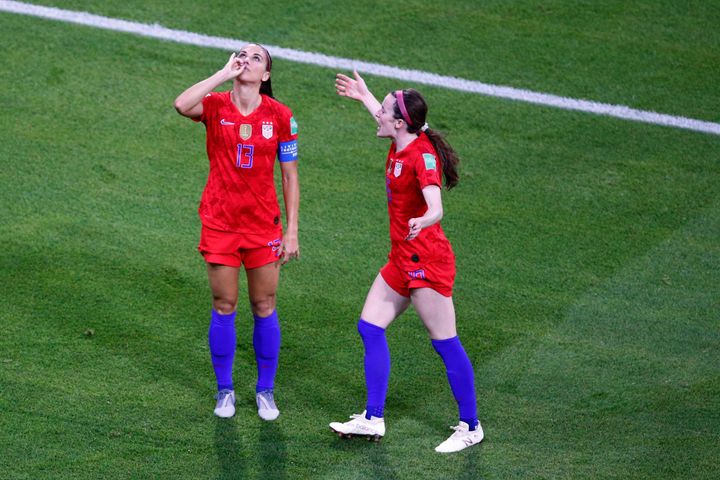 Alex Morgan celebrates after scoring a goal against England in the FIFA Women's World Cup.