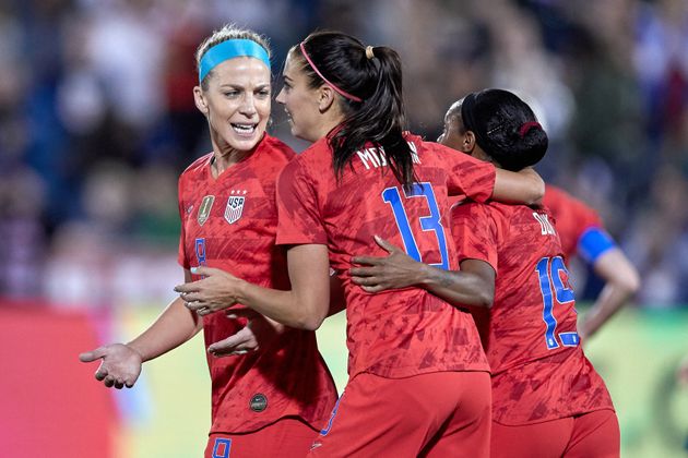 Morgan celebrates with Ertz and Crystal Dunn after scoring her 100th international goal in game action during an friendly match between the United States and Australia on April 4, 2019, in Commerce City, Colorado.