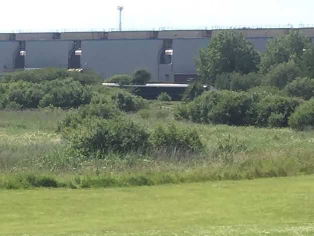 The scene on a section of track near Port Talbot after two railway workers died after being struck by a train.