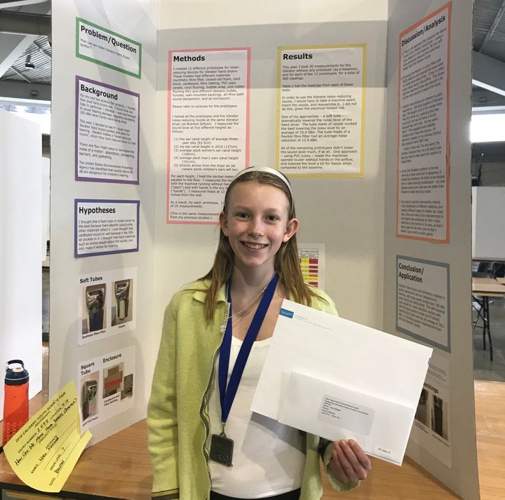Nora Keegan in 2018, presenting her research on how to make hand dryers quieter.