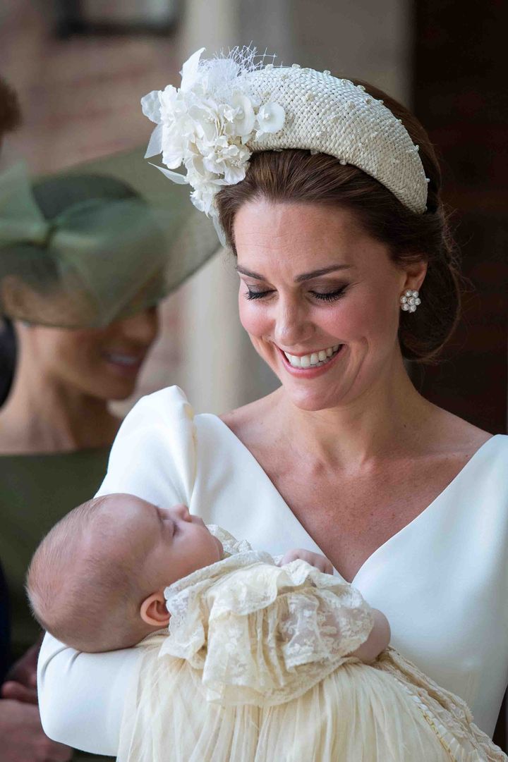 Kate Middleton holds the sleeping Prince Louis at his christening service at the Chapel Royal, St James's Palace, on July 9, 2018.