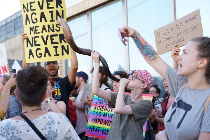 People participate in a "Never Again Action" protest in Elizabeth, New Jersey, on June 30.