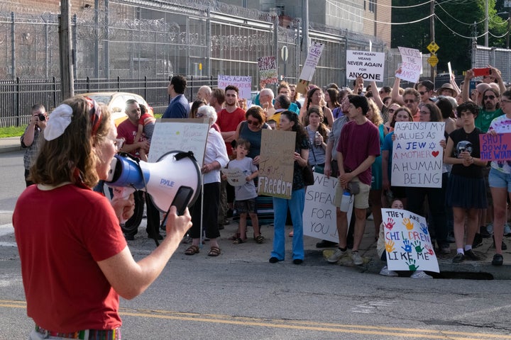 Protesters participate in a "Never Again Action" march in Central Falls, Rhode Island, on Tuesday.