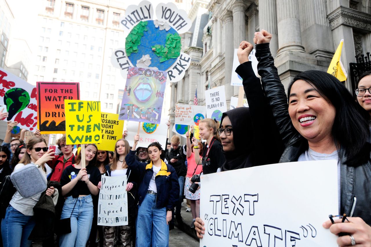 City Councilwoman Helen Gym, far right, rallies outside City Hall at the Climate Strike in Philadelphia on March 15.