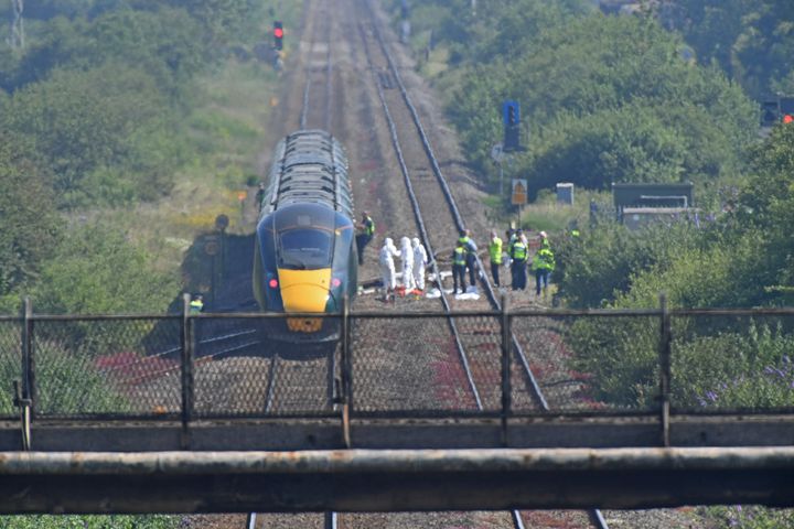 The men were killed on Wednesday morning on tracks near Port Talbot in Wales 
