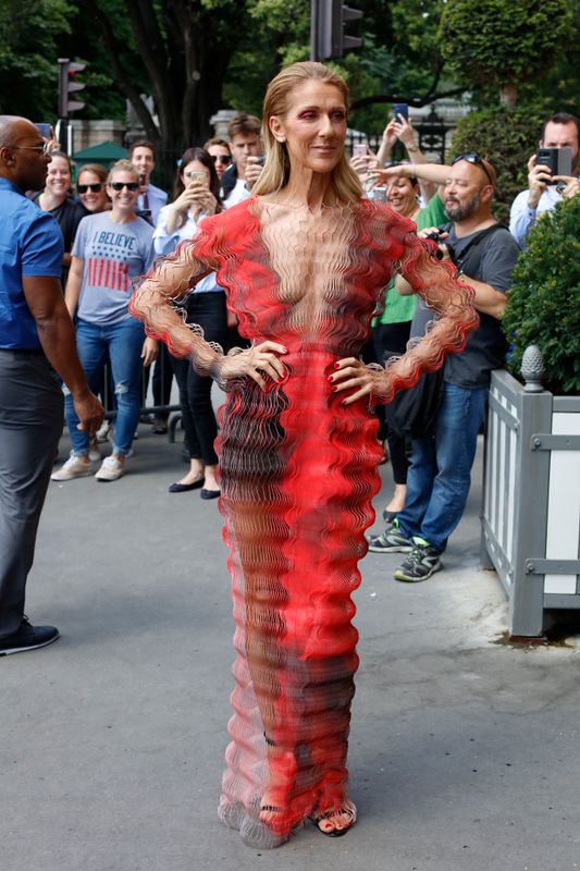 Yes, this is the same day. Yes, this dress is nearly see-through. Yes, she changed up her outfit to attend the Iris van Herpen show. Yes, she continues to be incredible.