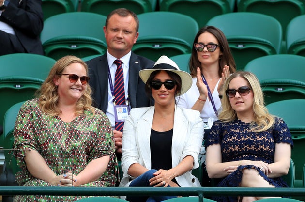 The Duchess of Sussex and friends watching Serena Williams play a match at the Wimbledon tennis tournament...