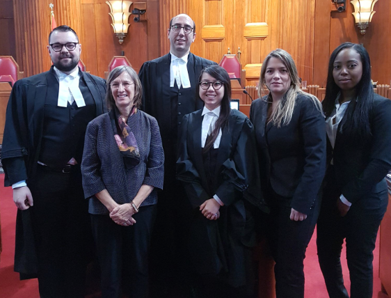 Linda Vannucci, second from left, poses with some of her staff from the Workers' Health & Safety Legal Clinic at the Supreme Court of Canada in December 2018.