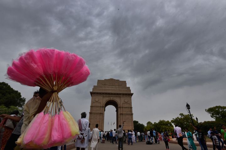 India Gate in a file photo. The day ahead is forecast to remain generally cloudy with possibility of light rain.