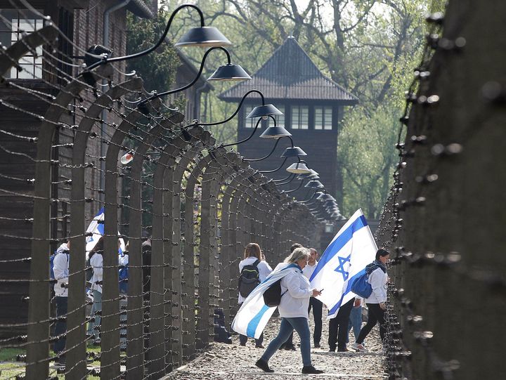 Participants in the Jewish event of Holocaust remembrance walk in the former Nazi World War II death camp of Auschwitz in Oswiecim, Poland, in May 2019.