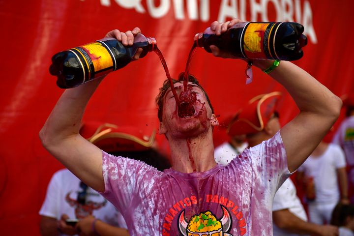 Reveler gets down to Saturday on the first day of the San Fermin Fiesta that features the annual running of the bulls.